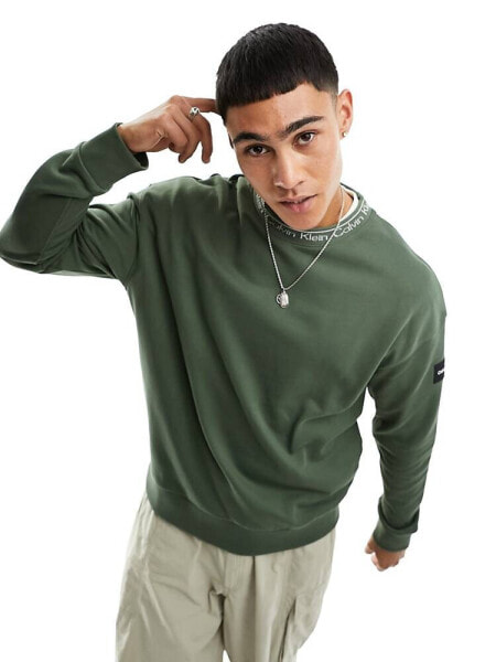 Calvin Klein running logo comfort sweatshirt in green