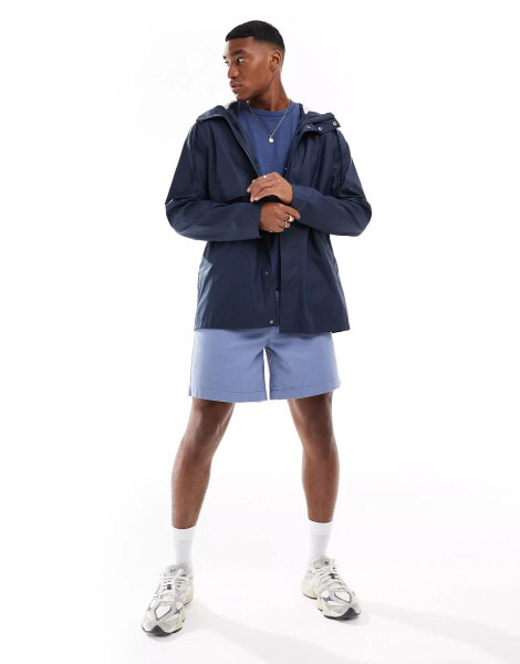 ASOS DESIGN shower resistant rubberised rain jacket in navy