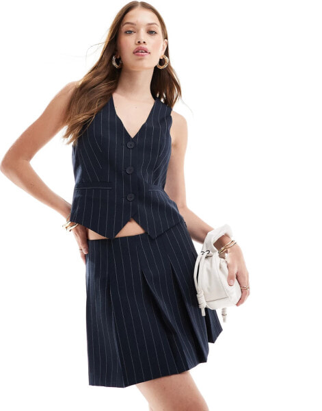 ASOS DESIGN waistcoat in navy pinstripe