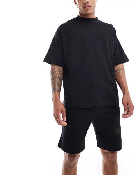 ASOS DESIGN pyjama set with oversized t-shirt and shorts in jersey in black