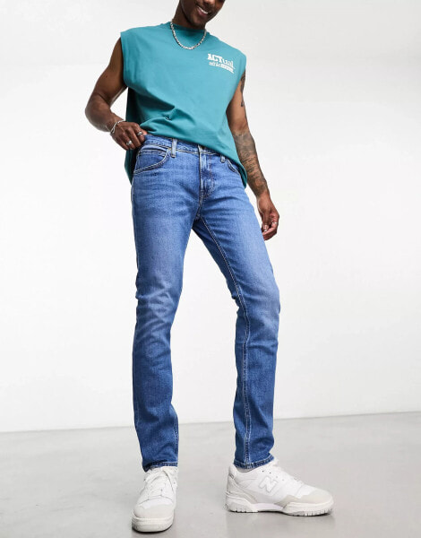 Lee Luke slim tapered fit jeans in mid wash