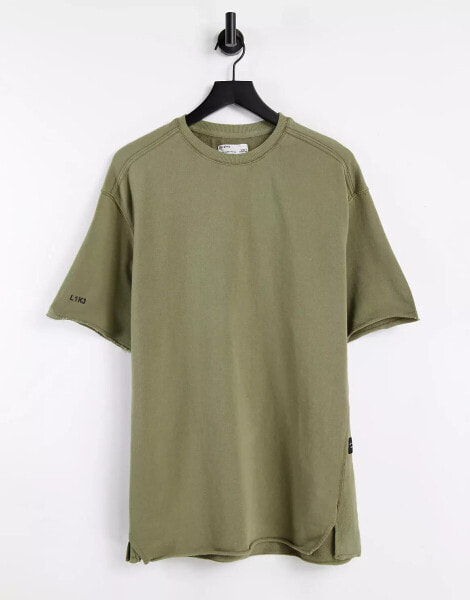 Bershka washed t-shirt with raw edge in green