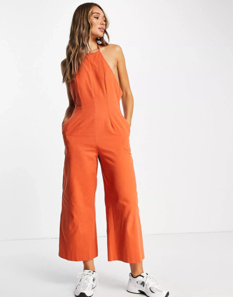 ASOS DESIGN twill strappy halter neck jumpsuit with wide leg in rust