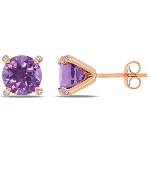 Gemstone and Diamond Accent Stud Earrings in 10k White Gold. Available in Blue Topaz (4-3/4 ct.t.w.), Citrine (3 5/8 ct.t.w), Garnet (4 ct.t.w.), Amethyst (3 ct. t.w.) & Prasiolite (3 1/2 ct.t.w.)