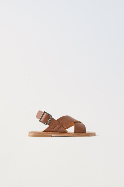 Leather crossover sandals