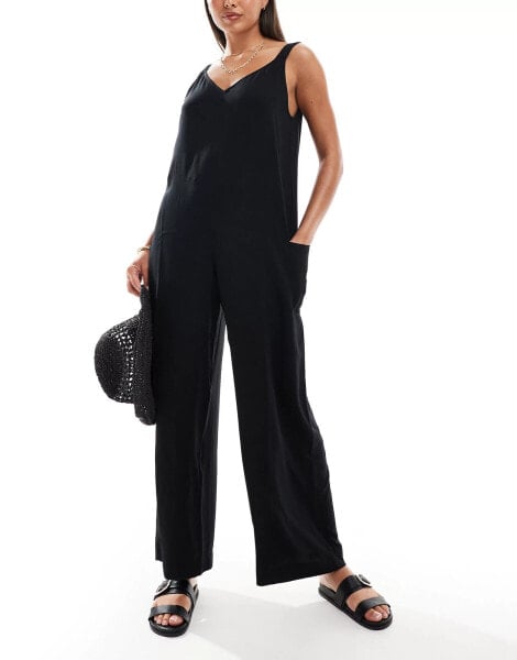 ASOS DESIGN beach jumpsuit with pocket detail in black