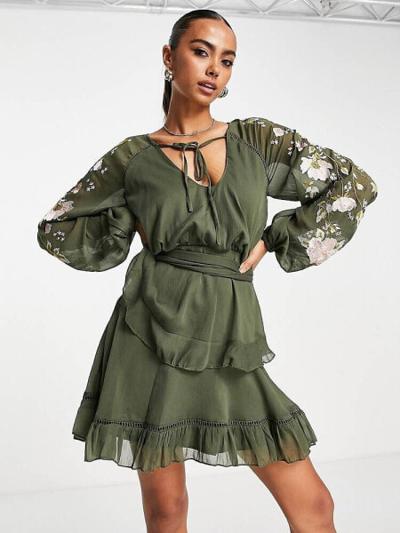 ASOS DESIGN blouson sleeve tiered mini dress with cross stitch embroidery detail and tie in khaki