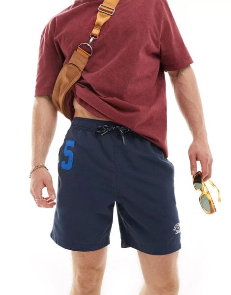 Superdry Polo 17" swim shorts in richest navy