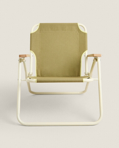 Children’s folding beach chair with wooden armrests