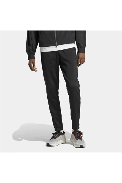 Женские брюки Adidas Tiro Suit-UP Advanced Track Pant