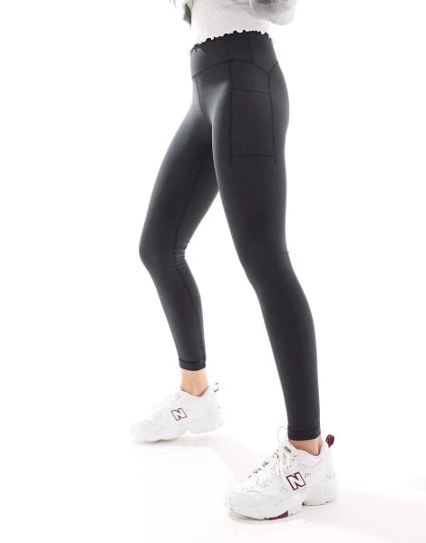 New Balance Nb sleek pocket high rise legging 27" in black