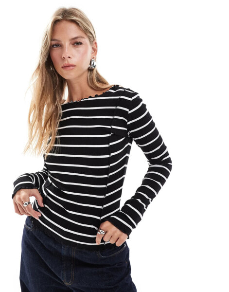 Brave Soul long sleeve lettuce hem top in black and white stripe