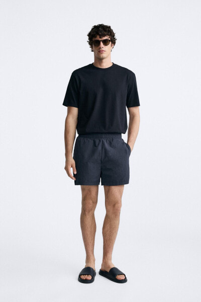 REGULAR TECHNICAL SWIMMING TRUNKS