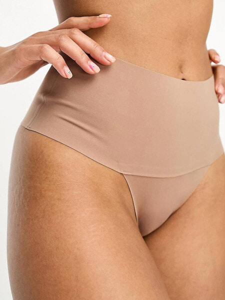 Spanx Undie-tectable smoothing thong in cafe au lait