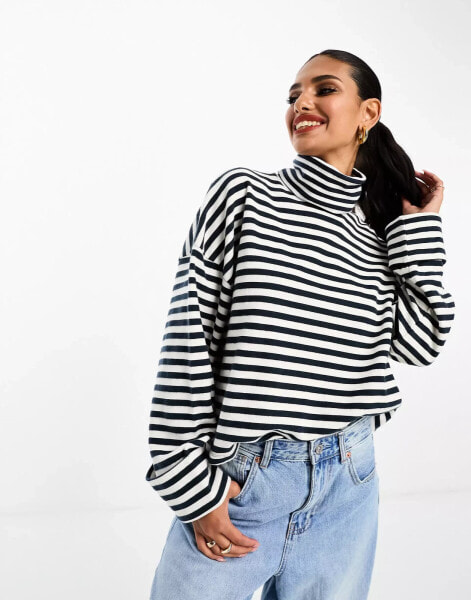 ASOS DESIGN super soft boxy roll neck in navy and cream stripe