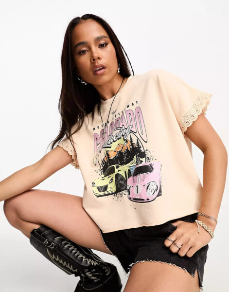 Miss Selfridge festival graphic oversized boxy crop t-shirt with broderie trim in apricot