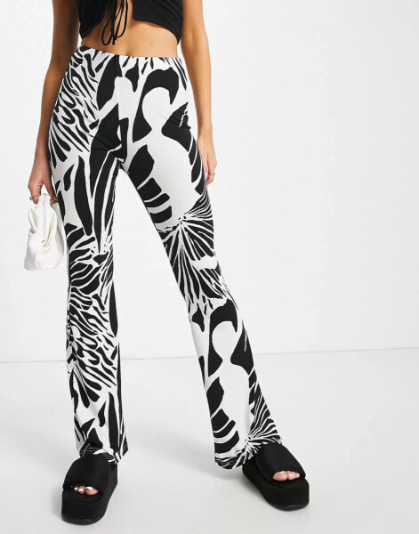 River Island abstract wing print flare trouser in cream