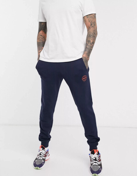 Jack & Jones Originals badge logo sweat joggers in navy