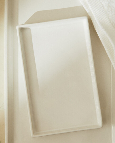 White earthenware bathroom tray