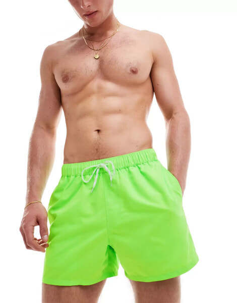 ASOS DESIGN swim short in short length in neon green