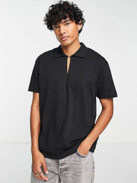 ASOS DESIGN relaxed fit polo with clasp detail in black