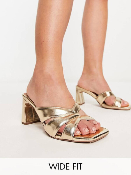 ASOS DESIGN Wide Fit Hatley mid heeled mules in gold