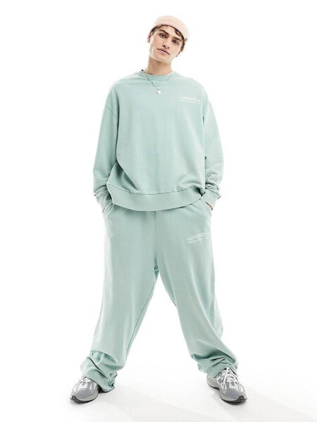 COLLUSION STUDIOS joggers in teal wash co-ord