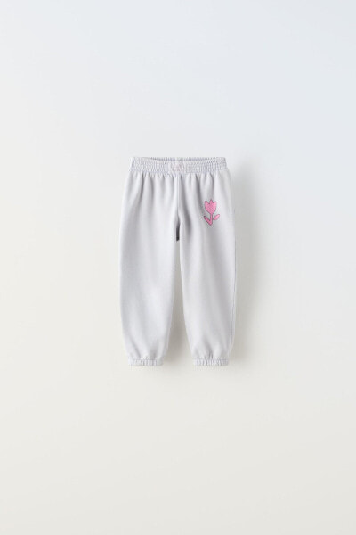 Faded-effect plush trousers