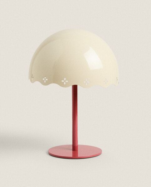 Children's lamp with die-cut shade