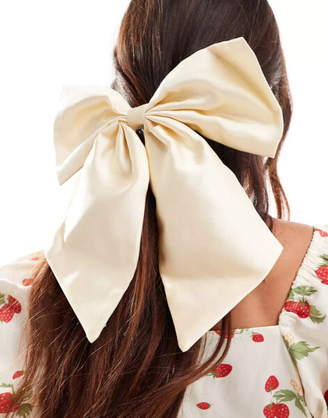 ASOS DESIGN hair clip with oversized bow in cream