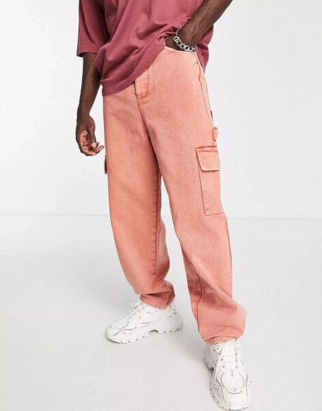 ASOS DESIGN wide fit cargo trousers with heavy vintage wash in rust