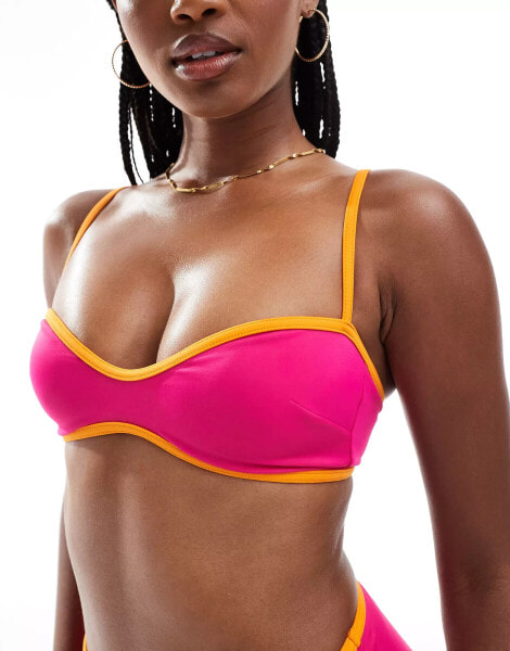 ASOS DESIGN contrast binding shaped bandeau bikini top in pink