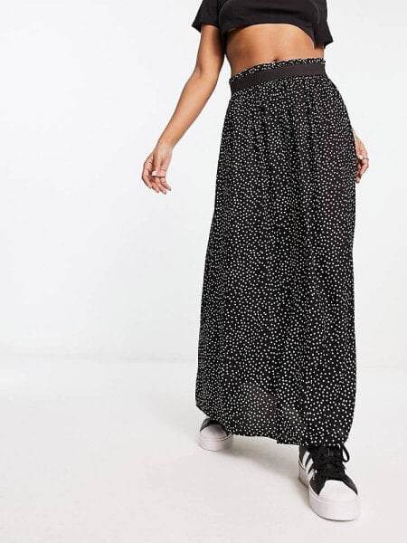 Only pleated midi skirt in black spot print