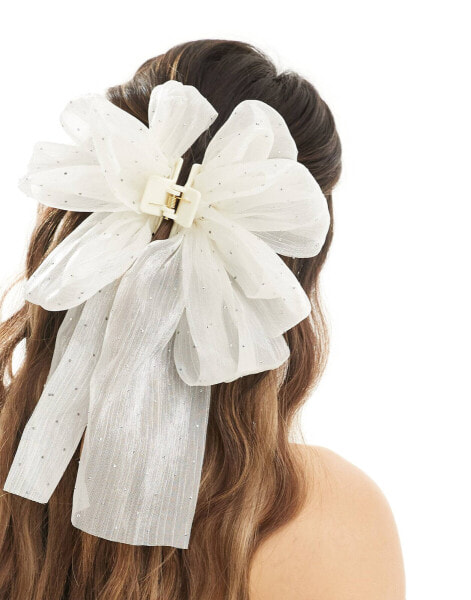 True Decadence bow hair claw in white