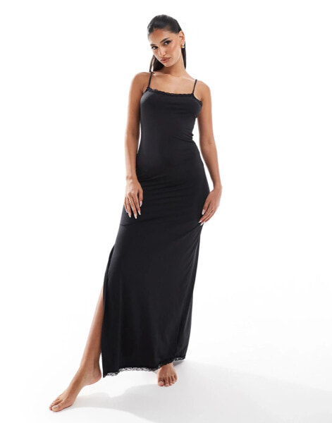 ASOS DESIGN Tia maxi slip dress with side slit & lace trim in black