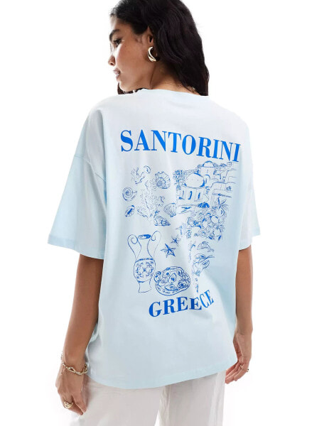 ASOS DESIGN oversized t-shirt with Santorini graphic in baby blue