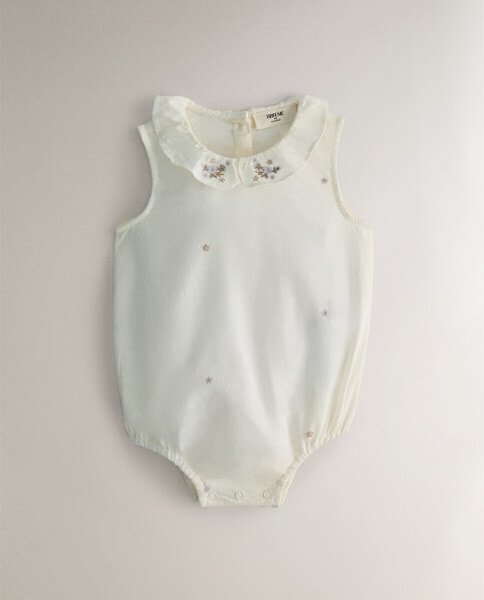 Children's bodysuit with floral embroidery