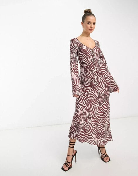 ASOS DESIGN tie front long sleeve midi dress in zebra print