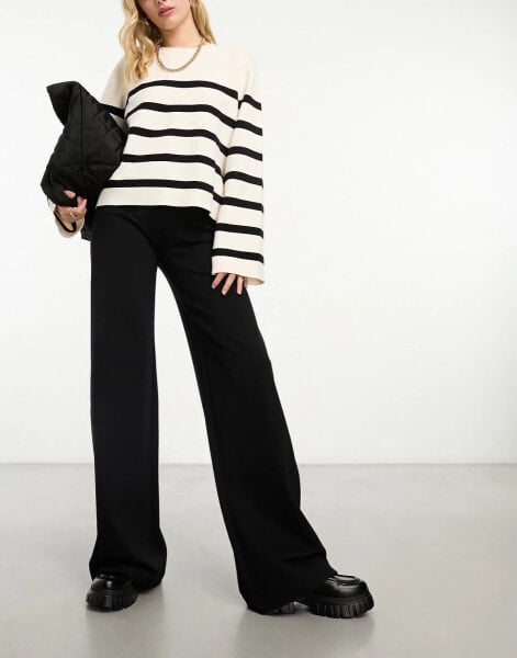 & Other Stories high waist flared trousers with clean waistband in black