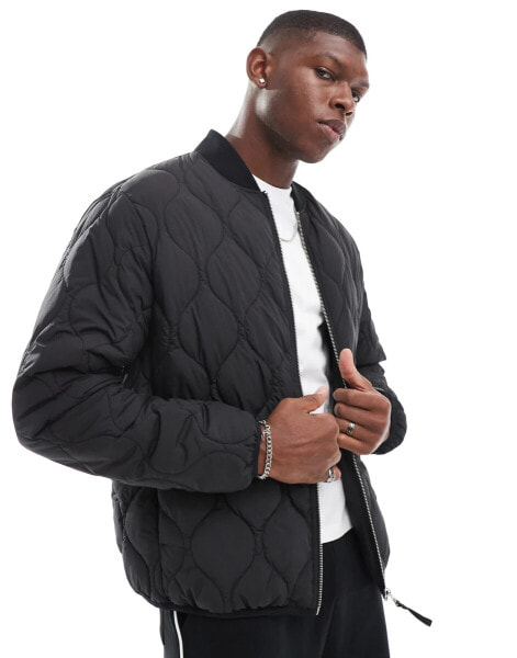 Jack & Jones quilted bomber jacket in black