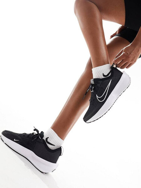 Nike Running Interact Run trainers in black and white