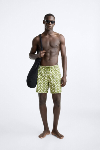 LONG GEOMETRIC PRINT SWIMMING TRUNKS