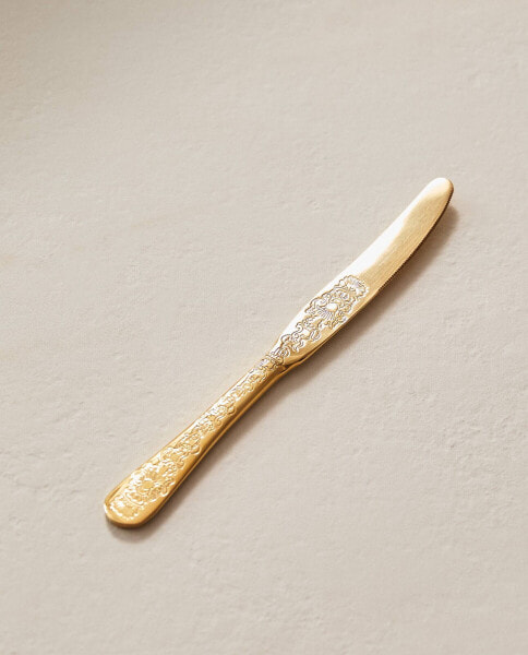 Engraved golden knife