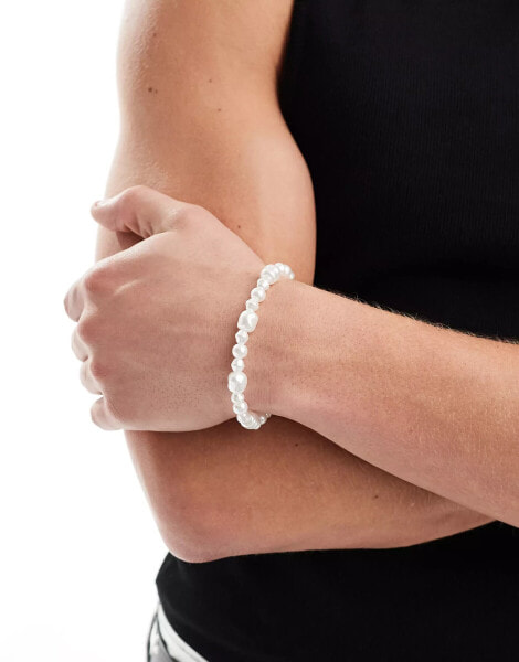 ASOS DESIGN irregular faux pearl bracelet with t-bar in white