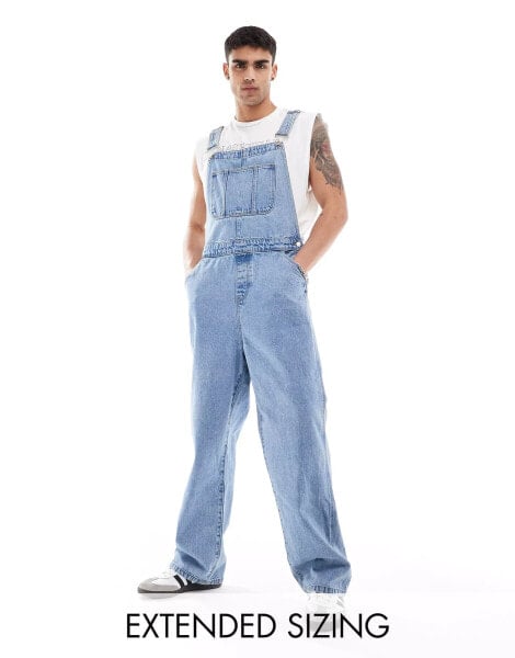 ASOS DESIGN oversized denim dungaree in mid wash blue