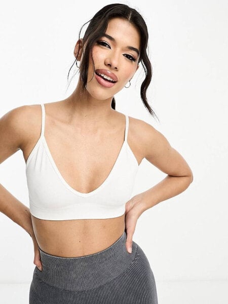 ASOS 4505 Icon seamless active intimate light support sports bra in white