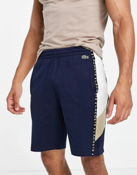 Lacoste taped side panel shorts in navy