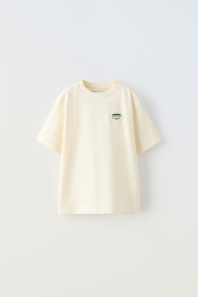 T-shirt with embroidered patch