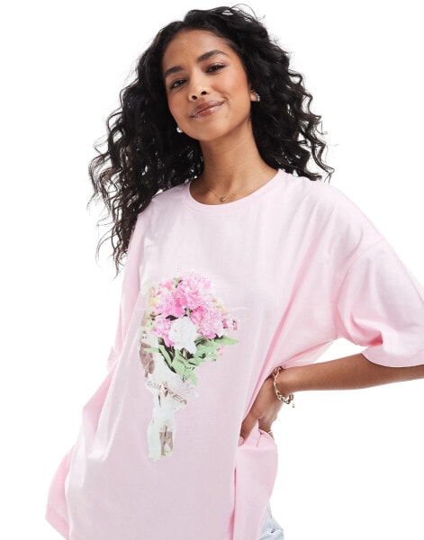 ASOS DESIGN oversized t-shirt with flower bouquet graphic in rose pink