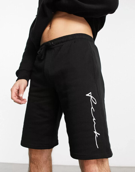 FCUK side scribble jersey shorts in black